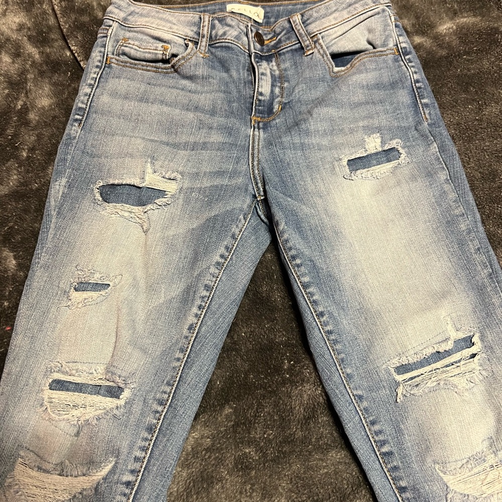 Euc cello size 5 distressed jeans. All holes are patched